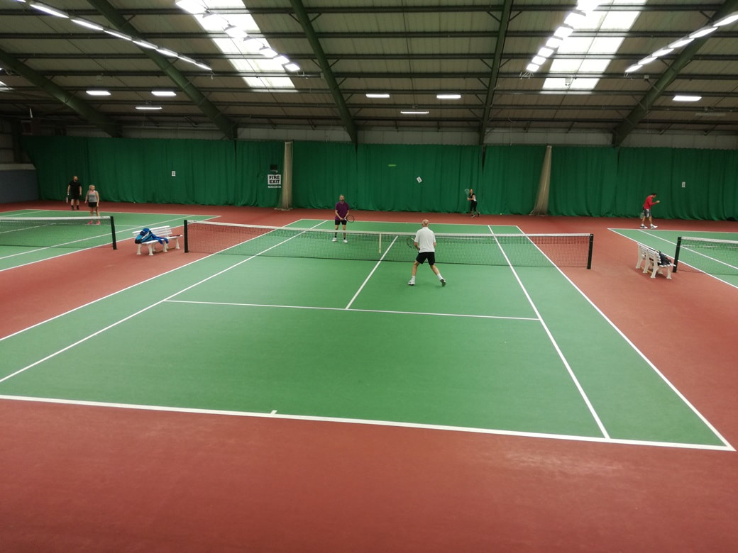 Club night on the courts in the main tennis hall